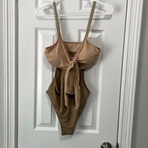 NWOT cut out one piece suit